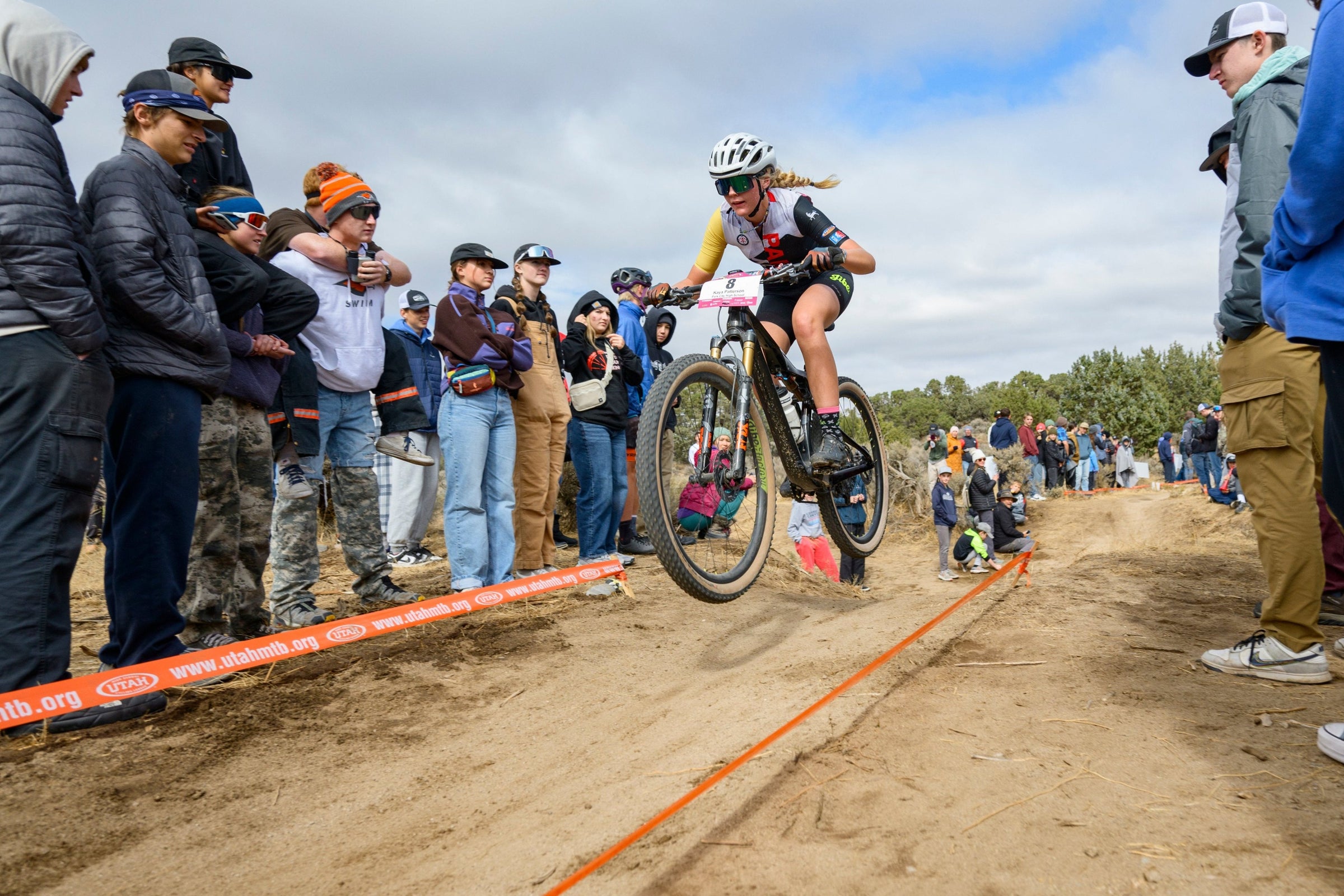 Jibe rider Kaya Patterson catching her racing her bike at Utah state championships in Cedar City, Utah.